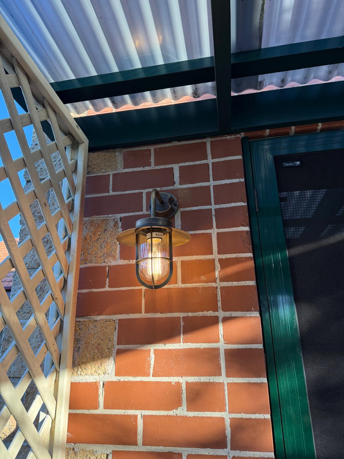 Entry light after — new bulkhead fitting with warm lamp