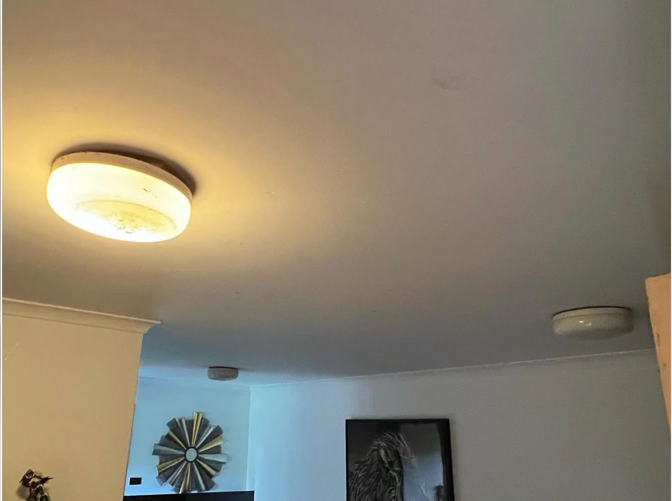 Ceiling light before — old yellowed fitting